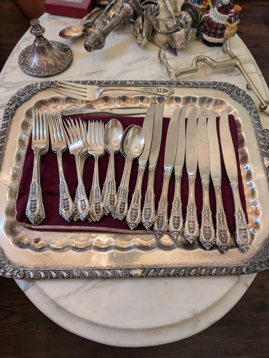 Rose point sterling by Wallace. 8 place setting 