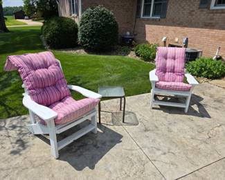 Two very nice wooden Adirondack chairs with cushions. 
