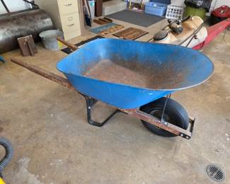 Metal wheelbarrow.