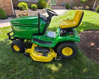John Deere LX279, 17Hp engine, mulching attachment, 48" mowing deck, 1100 hours. Looks and runs like it's brand new! Extra blades and belts go with the mower as well.