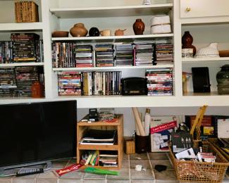Music CDs, DVD tv series and movies. Small monitor / tv