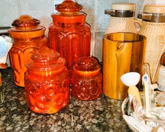 Red/orange sun and moon canister set - decanters