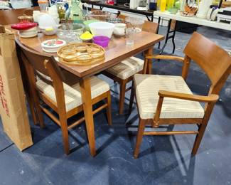 Walnut dining table, 6 chairs, leaf. $2000.