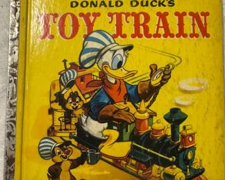 Walt Disney's Donald Duck's Toy Train Golden Book 1950 Copyright by Walt Disney Productions.
USA Shipping Only.