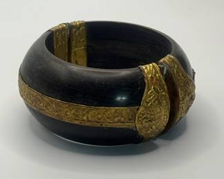 Interesting Black Cuff with Brass accent
USA Shipping Only.