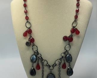 Eccentric Necklace with Red Plastic medium & Large Beads. Adjustable dark color chain.
Matches Earrings #1391.
USA Shipping Only.