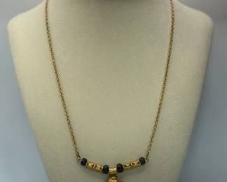 Golden frog with black bead and golden decorative Beads. Mini link Chain. 18-1/2".
USA Shipping Only.