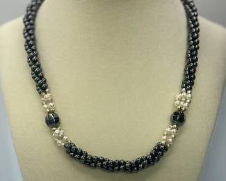 Hematite & Pearl Beaded Braided Necklace. Take a peek! Most of the beads are 6mm with a few 4mm and 10 mm faceted hematite. Screw clasp. Approximately 17-12".
USA Shipping Only.