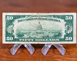 This lot features a 1929 $50 Federal Reserve Bank Note from the Federal Reserve Bank of New York. 
