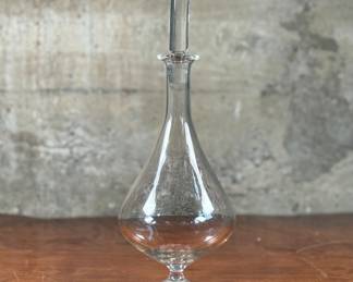 This lot features a french wine decanter by Eugen Von Boch for Villeroy & Boch. Signed by Eugen as shown in photos and bears maker mark underneath. Measures 15” H x 6” W x 6” D. Eugène Boch (1 September 1855 – 3 January 1941) was a Belgian painter, born in Saint-Vaast, La Louvière, Hainaut. He was the younger brother of Anna Boch, the only female member of Les XX.
