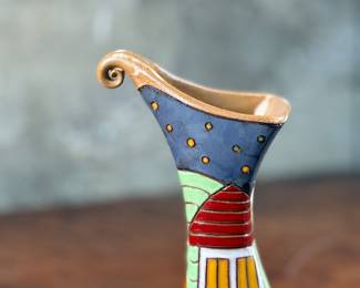 This lot features a stunning handmade flower pottery vase by Gappa in the town of Goole in the UK. Measures, 9” H x 4” W x 3.5” D. Maker mark present underneath as shown in photos.
