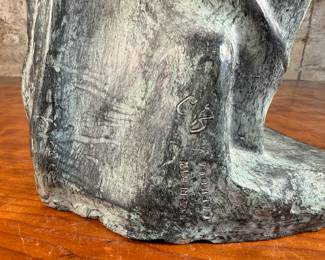 This lot features a famous replica of the Venus de Milo, one of the most famous ancient Greek sculptures. Made in Spain with maker mark near bottom as shown in photos. This sculpture is believed to be made of a hollowed bronze and measures, 24” H x 7.5” W x 7.5” D. The Venus de Milo is a masterpiece of Hellenistic sculpture and is renowned for its idealized beauty and enigmatic appeal, partly due to its missing arms.
