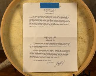 “Tlingit Eagle”, artwork on a drum by listed artist Jerry Lieb, Jr., otherwise known as Sivaluaq circa 2006. This work comes with a mounted handle and measures, 21.75” H x 15” W. Artist and artwork information on the verso as shown in photos.
