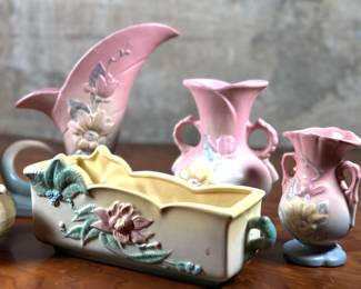 This lot features seven pieces of antique Hull pottery in very good condition. The tallest piece measures 8.5” H x 9” W x 3” D. Hull pottery began production in 1905 in Crooksville, Ohio, under the leadership of Addis Emmet (A.E.) Hull. The Hull Pottery Company’s early lines consisted of common utilitarian stoneware, semi-porcelain dinnerware and decorative tile.
