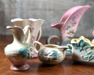 This lot features seven pieces of antique Hull pottery in very good condition. The tallest piece measures 8.5” H x 9” W x 3” D. Hull pottery began production in 1905 in Crooksville, Ohio, under the leadership of Addis Emmet (A.E.) Hull. The Hull Pottery Company’s early lines consisted of common utilitarian stoneware, semi-porcelain dinnerware and decorative tile.
