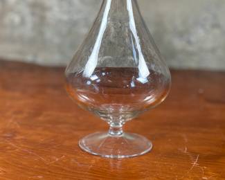 This lot features a french wine decanter by Eugen Von Boch for Villeroy & Boch. Signed by Eugen as shown in photos and bears maker mark underneath. Measures 15” H x 6” W x 6” D. Eugène Boch (1 September 1855 – 3 January 1941) was a Belgian painter, born in Saint-Vaast, La Louvière, Hainaut. He was the younger brother of Anna Boch, the only female member of Les XX.
