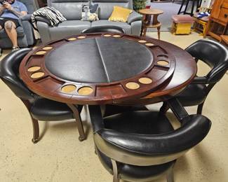 $565 Pre Sale Item - See Sale Description for purchase details. Game table, leatherette, removable top and includes 4 chairs. Game top removes leaving free standing round pedestal table. 61"d. Pic 1 of 7