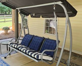 $175 Pre Sale Item - See Sale Description for purchse details. Patio Glider, 3 seater - Includes cushions. 77"L x 45"w x 67"h, seat area 59" x 19" x 19"
