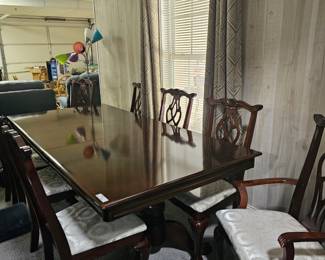 $750 Pre Sale Item - See Sale Description for purchase details. Dining Table, 8 chairs, Chairs upholstered, white fabric. 89"l w/leaf, leaf 18", 42"d x 31"h. Pic 2 of 5