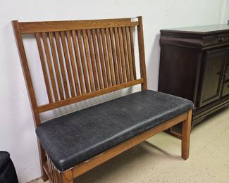 $215 Pre Sale Item - See Sale Description for purchase details. Bench Mission Style - upholstered fabric, black leather look. 41.5"w x 43"h x 21.5"d. Pic 1 of 3