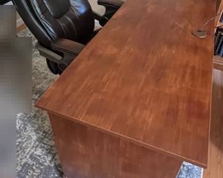 Office Desk With Cushioned Rolling Chair