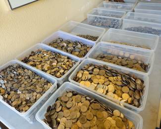 Sorting 200 pounds of Pesos of various denominations. These will be sold by the pound for crafts, spending or stashing away.