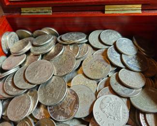 Example of 200 pounds of various denominations of pesos to be sold by the pound and by the piece. They were used in place of poker chips for a poker club.  Great for making jewrlry or button covers too.