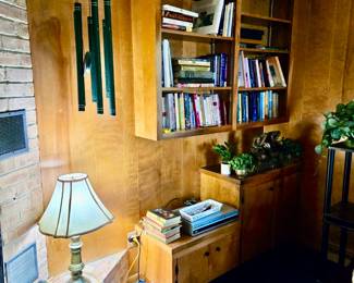 Windchime; Lamp; Books; Silk Plants; Plant Stand