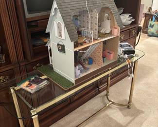 Dollhouse on glass sofa table