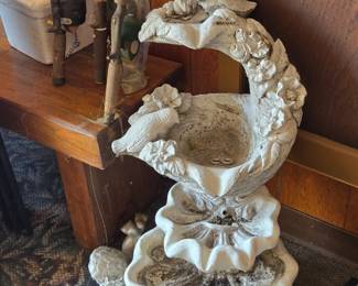 Fishing Poles and Outdoor Multi-Level Water Fountain