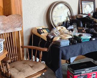 Large Wall Clock; Adding Machine; Ambico Video Transfer still in box; Oak Carved & Pressed Back Northwind Armchair; Telephones of all kinds and much more!