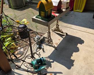 Wrought Iron Plant Stand; Bird Feeders; Sleds & Saucers; Wood Table with Wrought Iron Legs