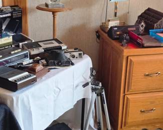 Electric Typewriter; Camera Stand; Vintage Cassette Recorders; Vintage Cameras; Plant Stand; Lamp and much more!