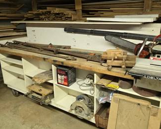 Delta Table Saw, Chain Saw, Wood & Metal Clamps; Electric Hand Saws, Lots of Wood; Work & Storage Unit on Wheels