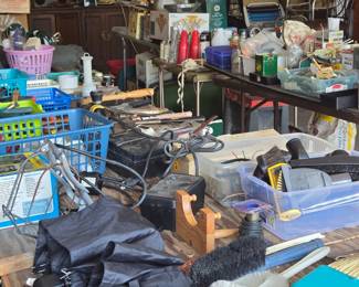 The upper garage is chock full of goods for house repair and cleaning.  