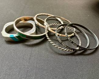 Silver bangles, including Los Castillo 