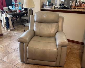 Living spaces recliner with power headrest and lumber. Purchased 6/17/21