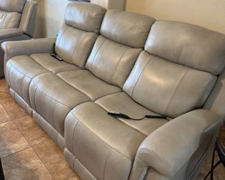 Living Spaces reclining sofa with power headrest heat and massage. Purchased 6/17/21