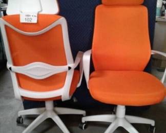 Executive Chair, orange color, adjustable height.