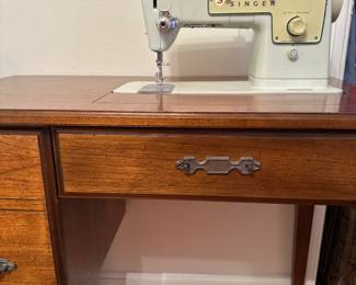 Singer sewing machine and cabinet