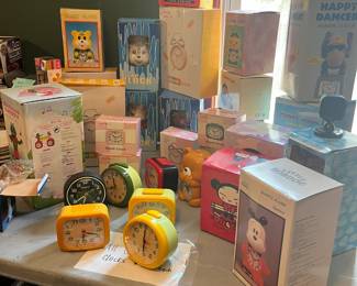 small alarms clock, many in original boxes