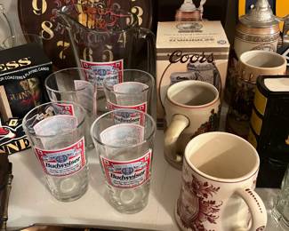 bar clocks, signs and steins