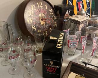 Lots of bar ware inclusing Bud pitcher and 4 pint glasses