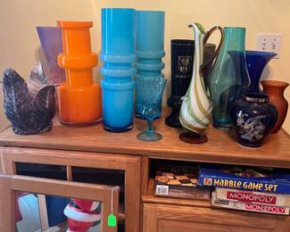 large college of glass vases including a Murano glass pitcher shaped vase