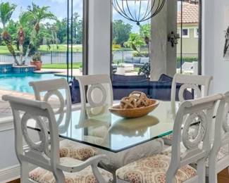 Marc Michaels Interiors solid wood dining chairs and glass table $1200