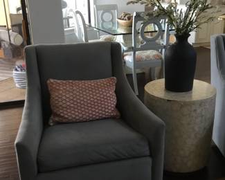 Chairs, table, vase and plant