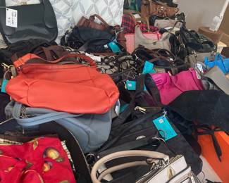 Some of the purses...Designesd like Michael Khors, Coach ,Dooney, Fossil, Tignanello