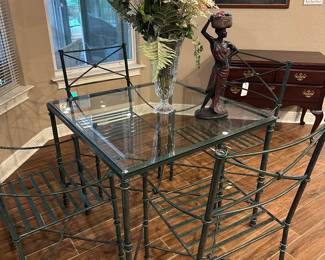 Solid iron table and 4 chairs with cushions
High end/ designer 