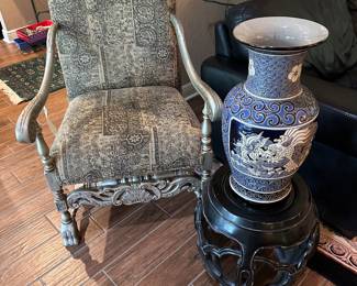 Silver oriental chair and blue and black oriental vase and garden seat