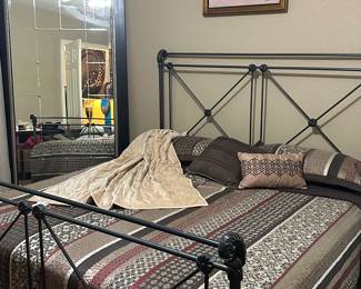 King size iron headboard and footboard with older mattress but clean 